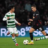Celtic midfielder Matt O'Riley challenges RB Leipzig's Andre Silva during a UEFA Champions League Group F match earlier in the season.
