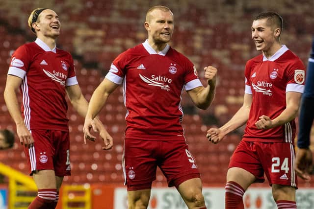 Curtis Main celebrates making it 2-0 to Aberdeen. Picture: SNS