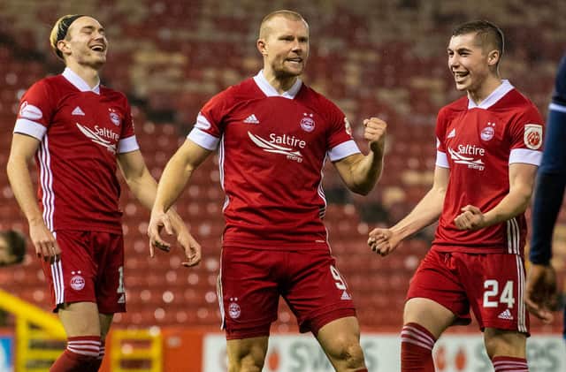 Curtis Main celebrates making it 2-0 to Aberdeen. Picture: SNS