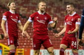 Curtis Main celebrates making it 2-0 to Aberdeen. Picture: SNS