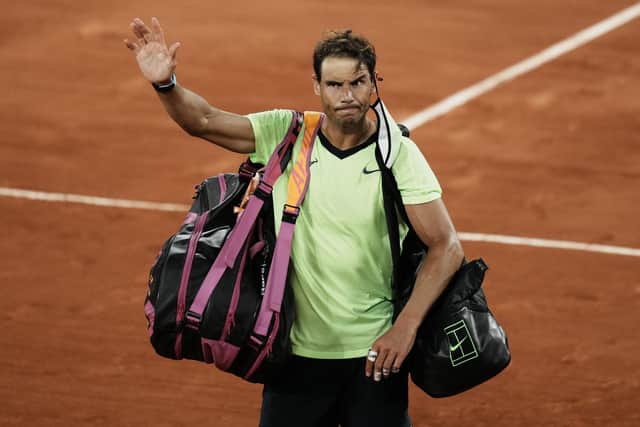 Rafael Nadal waves to the crowd after losing to Serbia's Novak Djokovic at Roland Garros. Picture: Thibault Camus/AP