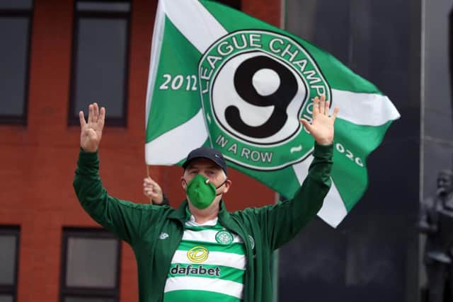 A Celtic fan outside Celtic Park.