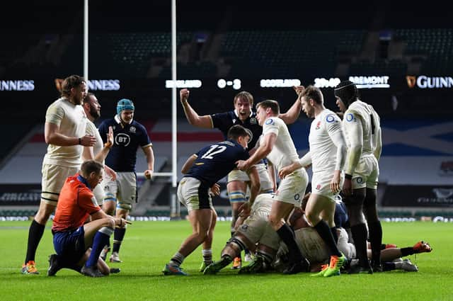 Jonny Gray celebrates as Duhan van der Merwe scores Scotland's first-half try at Twickenham. Picture: Mike Hewitt/Getty Images