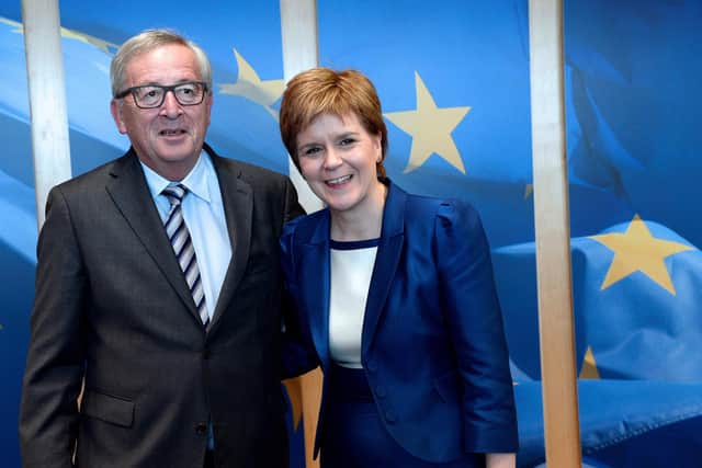 European Union Commission President Jean-Claude Juncker (L) poses with Scotland's First Minister and Leader of the Scottish National Party Nicola Sturgeon before their meeting at the European Union Commission headquarter in Brussels, June 29, 2016. Picture: THIERRY CHARLIER/AFP/Getty Images