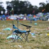 A broken camping chair is left behind at the end of the Glastonbury festival near the village of Pilton in Somerset. Picture: Andy Buchanan/AFP via Getty Images