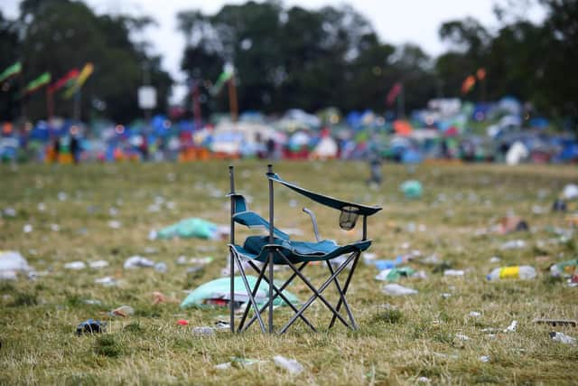 A broken camping chair is left behind at the end of the Glastonbury festival near the village of Pilton in Somerset. Picture: Andy Buchanan/AFP via Getty Images
