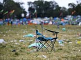 A broken camping chair is left behind at the end of the Glastonbury festival near the village of Pilton in Somerset. Picture: Andy Buchanan/AFP via Getty Images