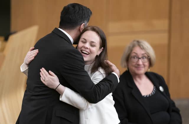 Humza Yousaf hugs Kate Forbes in the main chamber during the vote for the new First Minister at the Scottish Parliament in Edinburgh.
