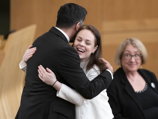 Humza Yousaf hugs Kate Forbes in the main chamber during the vote for the new First Minister at the Scottish Parliament in Edinburgh.