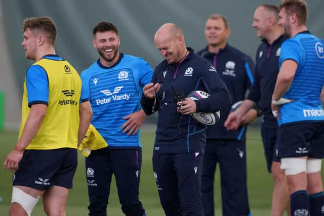 Gregor Townsend shares a smile with his Scotland players during training at Oriam.