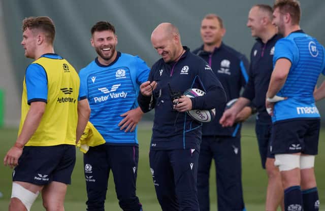 Gregor Townsend shares a smile with his Scotland players during training at Oriam.