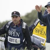 Calum Scott points something out to his caddie, James Vargas, during the final round of the 152nd Open at Royal Troon. Picture: Tom Russo/The Scotsman
