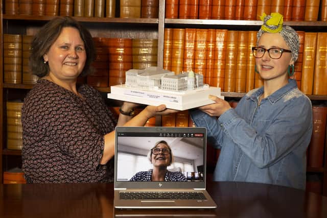 Susan Taylor, Rebecca Otto (on screen) and Franki Finch presenting model to the Mitchell Library (Photo by Alan Harvey / SNS Group)