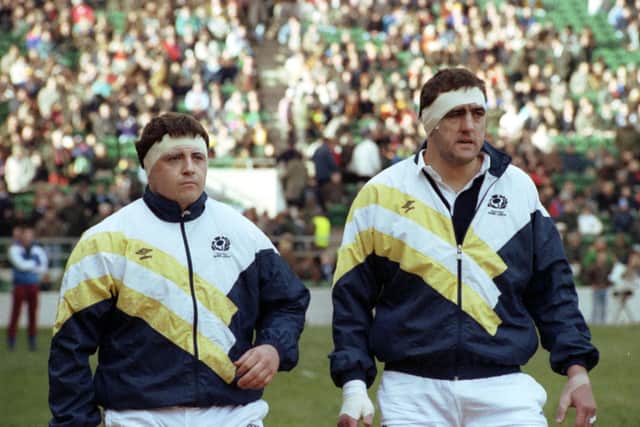 Chris Gray (right) and Paul Burnell singing as the Scottish national anthem ahead of the Calcutta Cup match against England at Twickenham in February 1991.
