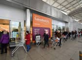 Shoppers queue outside a branch of Sainsbury's during the first lockdown in March 2020. Picture: Dan Mullan/Getty Images