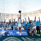 Argentina celebrate with the Visa Macro Cup after the Test series win over Scotland. (Photo by Pablo Gasparini / AFP)