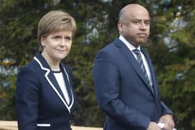 First Minister Nicola Sturgeon with Sanjeev Gupta, the head of the Liberty Group, ahead of a ceremony where Tata Steel handed over the keys of two Lanarkshire steel plants to metals firm Liberty House, at Dalzell steelworks in Scotland.