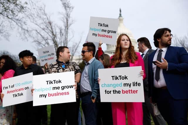Participants hold signs in support of TikTok outside the US Capitol Building in Washington, DC. Picture: Getty Images