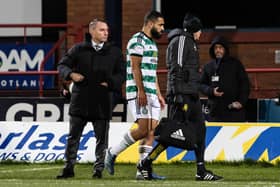 Celtic's Cameron Carter-Vickers goes off injured during the Boxing Day win at Dundee. (Photo by Ross Parker / SNS Group)