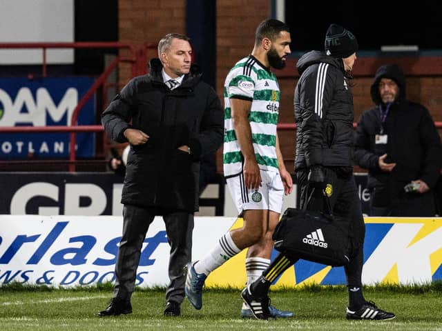 Celtic's Cameron Carter-Vickers goes off injured during the Boxing Day win at Dundee. (Photo by Ross Parker / SNS Group)