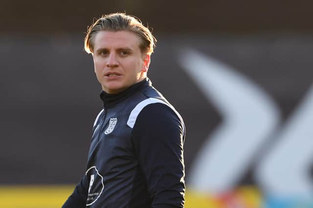 Jason Cummings has been sent home by Dundee for a breach of club discipline. (Photo by Craig Foy / SNS Group)