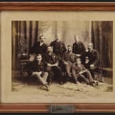 The photograph of the HMS Challenger research team who were based at 32 Queen Street, Edinburgh. The frame is made of wood taken from the ship's mast. PIC: NMS.