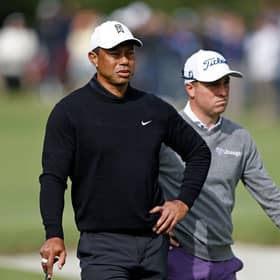 Tiger Woods and Justin Thomas wait to putt on the first green during the second round of the The Genesis Invitational at Riviera Country Club in Pacific Palisades, California. Picture: Michael Owens/Getty Images.