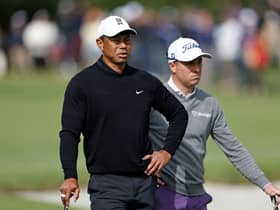 Tiger Woods and Justin Thomas wait to putt on the first green during the second round of the The Genesis Invitational at Riviera Country Club in Pacific Palisades, California. Picture: Michael Owens/Getty Images.