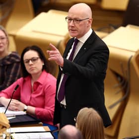 First Minister John Swinney addresses Holyrood during the first First Minister's Questions of the new year (Picture: Jeff J Mitchell/Getty Images)