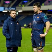 Edinburgh head coach Mike Blair with co-captain Grant Gilchrist at full time after the 32-25 loss to Glasgow Warriors. (Photo by Ross Parker / SNS Group)