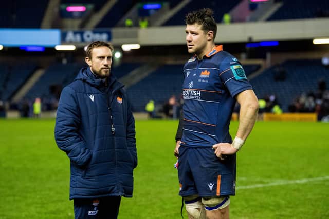 Edinburgh head coach Mike Blair with co-captain Grant Gilchrist at full time after the 32-25 loss to Glasgow Warriors. (Photo by Ross Parker / SNS Group)