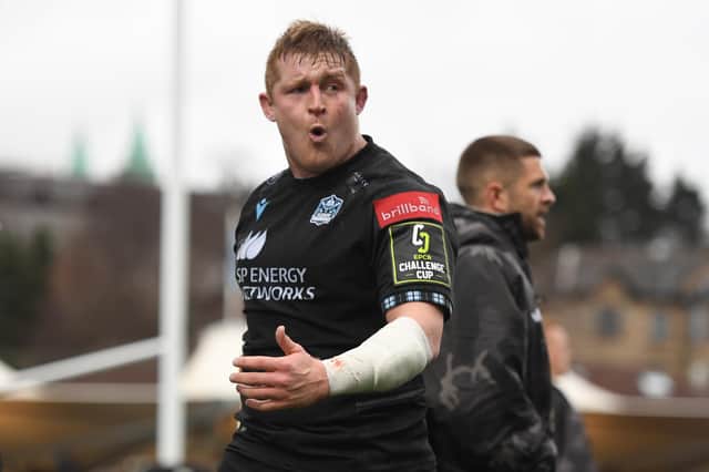 Glasgow Warriors' Johnny Matthews celebrates the second of his five tries against Dragons.  (Photo by Ross MacDonald / SNS Group)