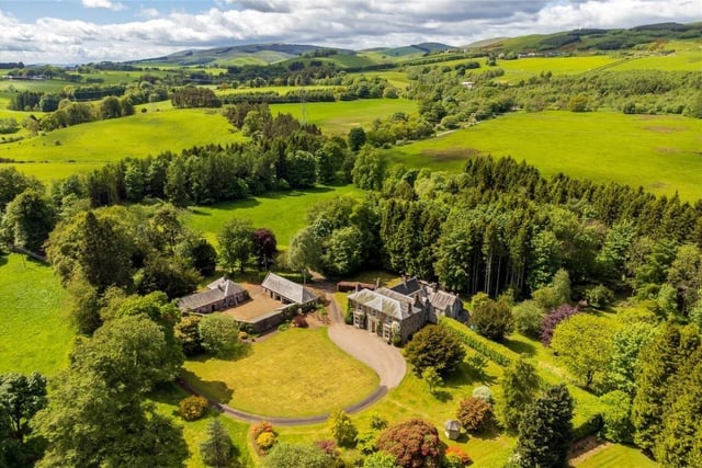 Aerial view showing beautiful countryside setting.