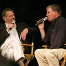 William Shatner, right, and the late Leonard Nimoy, the actors who portrayed Captain James T Kirk and Science Officer Mr Spock, in the original Star Trek television series, recall memories of the show in 2006 (Picture: Robyn Beck/AFP via Getty Images)