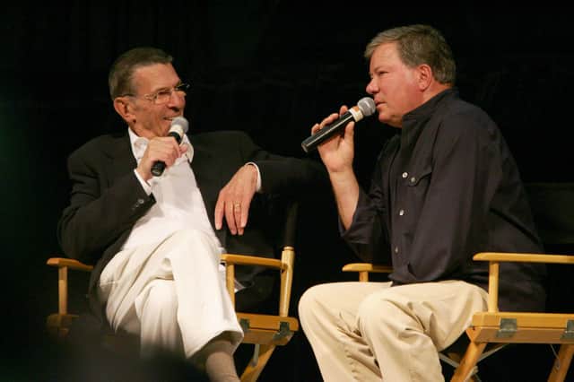 William Shatner, right, and the late Leonard Nimoy, the actors who portrayed Captain James T Kirk and Science Officer Mr Spock, in the original Star Trek television series, recall memories of the show in 2006 (Picture: Robyn Beck/AFP via Getty Images)