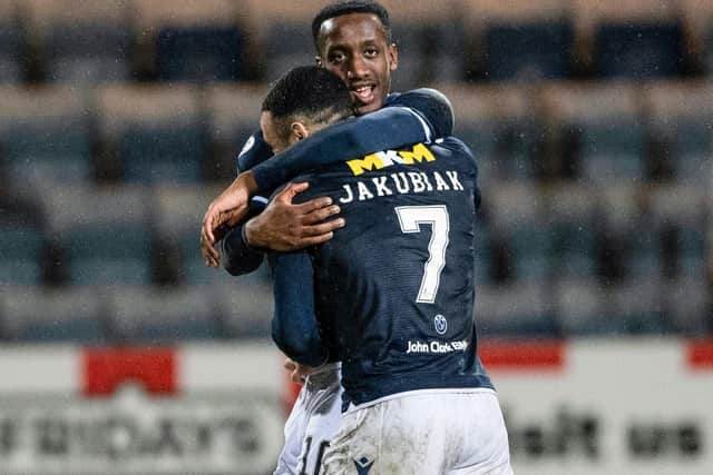 Dundee's Alex Jakubiak and Zach Robinson celebrate after the 3-1 win over Ayr United on Tuesday. (Photo by Paul Devlin / SNS Group)