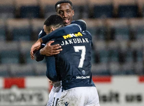 Dundee's Alex Jakubiak and Zach Robinson celebrate after the 3-1 win over Ayr United on Tuesday. (Photo by Paul Devlin / SNS Group)