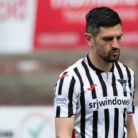 Dunfermline captain Graham Dorrans looks dejected at full-time after defeat to Queen's Park condemned his side to relegation. (Photo by Sammy Turner / SNS Group)