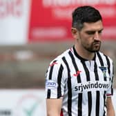 Dunfermline captain Graham Dorrans looks dejected at full-time after defeat to Queen's Park condemned his side to relegation. (Photo by Sammy Turner / SNS Group)