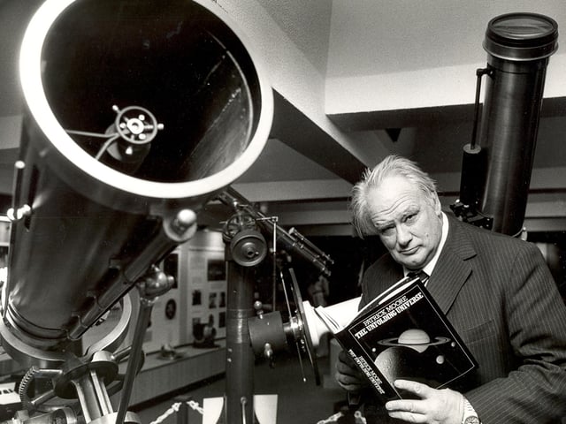 Patrick Moore launches his book 'The Unfolding Universe' to mark the 25th anniversary of his TV programme 'The Sky at Night' at the Royal Observatory, Blackford Hill, in May 1982
