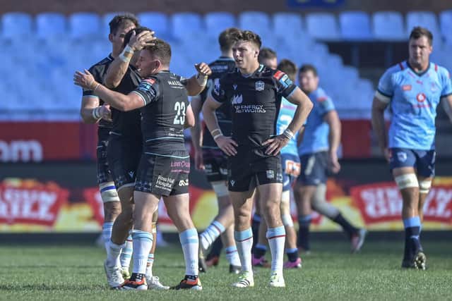 Mixed emotions at full-time for Glasgow Warriors players Sione Tuipulotu (hidden), Duncan Weir (23) and Jamie Dobie after the 40-34 loss to Vodacom Bulls at Loftus Versfeld. Weir's late penalty ensured Glasgow left with two bonus points. (Photo by David Gibson/Fotosport/Shutterstock)