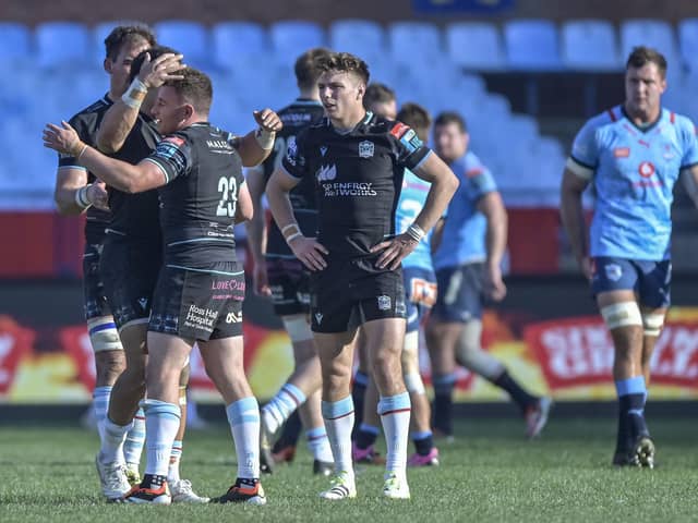 Mixed emotions at full-time for Glasgow Warriors players Sione Tuipulotu (hidden), Duncan Weir (23) and Jamie Dobie after the 40-34 loss to Vodacom Bulls at Loftus Versfeld. Weir's late penalty ensured Glasgow left with two bonus points.  (Photo by David Gibson/Fotosport/Shutterstock)