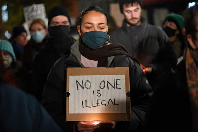 Protesters demonstrate against the British Government's policy on immigration and border controls outside of the Home Office in London (Photo by DANIEL LEAL/AFP via Getty Images)
