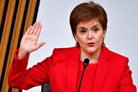 Nicola Sturgeon takes the oath before giving evidence to the Holyrood committee set up to investigate the Scottish government's handling of complaints made about Alex Salmond (Picture: Jeff J Mitchell/pool/AFP via Getty Images)