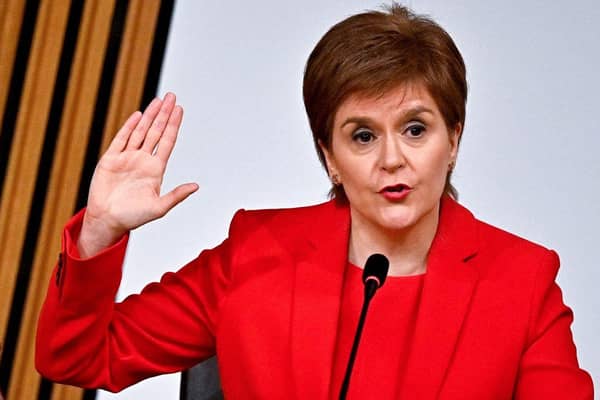 Nicola Sturgeon takes the oath before giving evidence to the Holyrood committee set up to investigate the Scottish government's handling of complaints made about Alex Salmond (Picture: Jeff J Mitchell/pool/AFP via Getty Images)