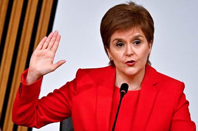 Nicola Sturgeon takes the oath before giving evidence to the Holyrood committee set up to investigate the Scottish government's handling of complaints made about Alex Salmond (Picture: Jeff J Mitchell/pool/AFP via Getty Images)