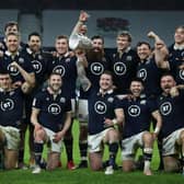 LONDON, ENGLAND - FEBRUARY 06:  Stuart Hogg, the Scotland captain, holds the Calcutta Cup as his team celebrate victory during the Guinness Six Nations match between England and Scotland at Twickenham Stadium on February 06, 2021 in London, England. Sporting stadiums around the UK remain under strict restrictions due to the Coronavirus Pandemic as Government social distancing laws prohibit fans inside venues resulting in games being played behind closed doors. (Photo by David Rogers/Getty Images)