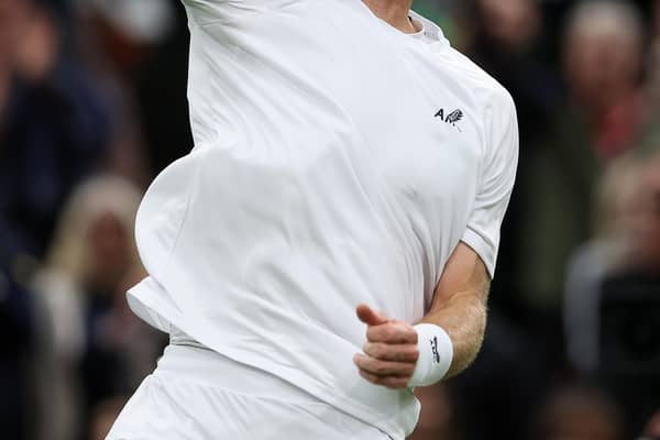 Andy Murray celebrates his first-round victory