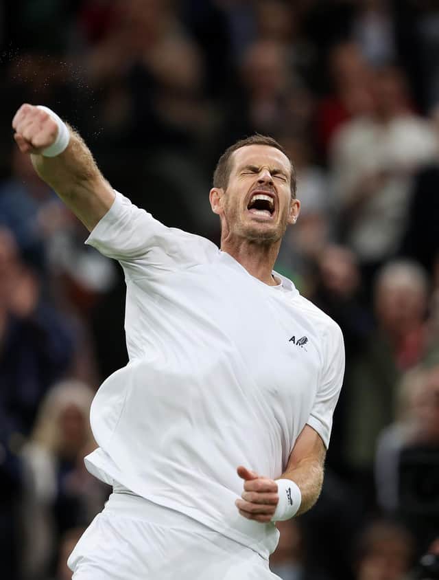 Andy Murray celebrates his first-round victory