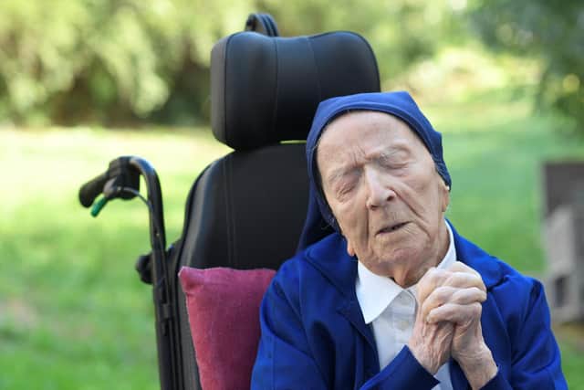 At 118, Sister Andre, also known as Lucile Randon, is now the world's oldest person.
 (Photo by NICOLAS TUCAT / AFP) (Photo by NICOLAS TUCAT/AFP via Getty Images)